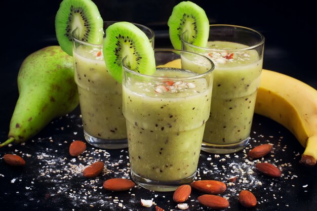 Healthy smoothie drink with fruit, almond and oat bran