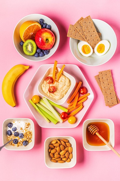 Healthy snack on a pastel background, top view.