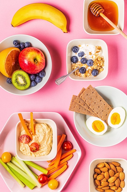 Healthy snack on a pastel background, top view.