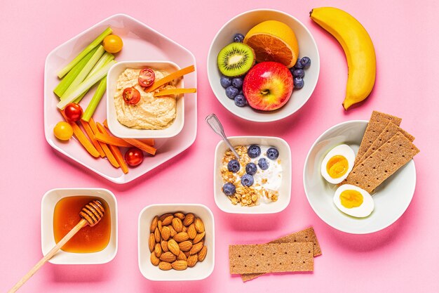 Photo healthy snack on a pastel background, top view.