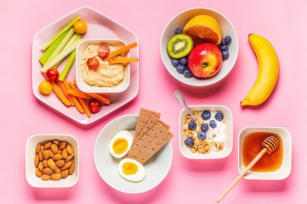 Healthy snack on a pastel background, top view.