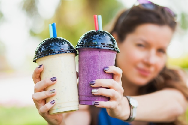 Photo healthy snack smoothie milkshake woman holding lifestyle summer closeup tasty drink