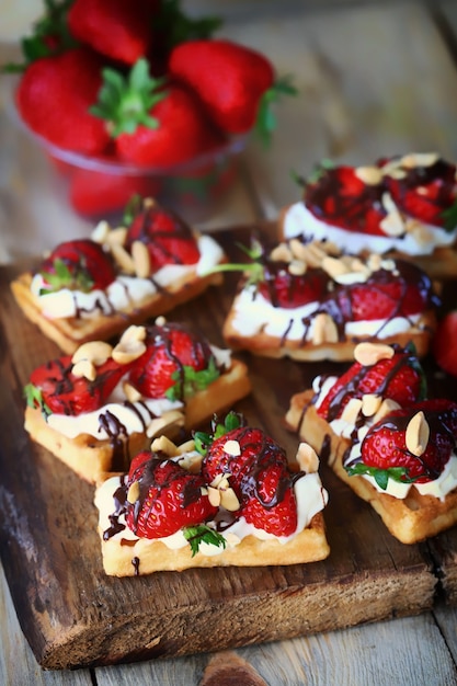 Healthy summer dessert Waffles with fresh strawberries
