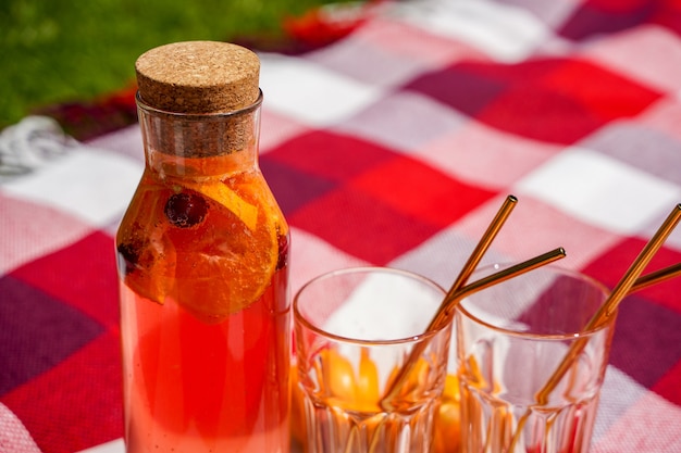 Healthy summer lemonade citrus and berry cocktails organic detox drink antioxidant homemade refreshing drink in a bottle