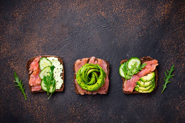 Healthy toasts with salmon and avocado rose 