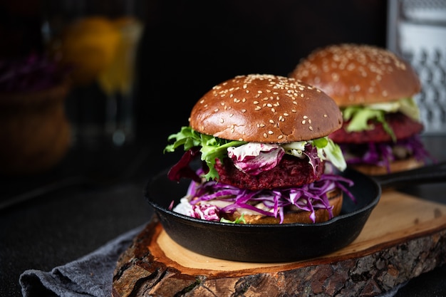 Healthy vegan beetroot burgers with red cabbage and lettuce