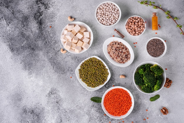 Healthy vegan food on a concrete background 