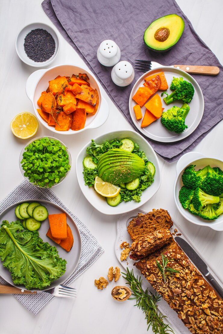 Healthy vegan food dinner table, top view. 