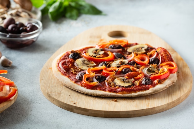 Healthy vegan pizza with vegetables