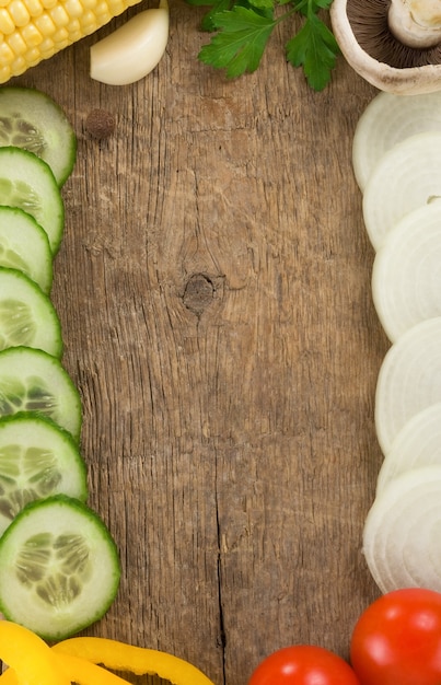 Healthy vegetable food at wooden table board