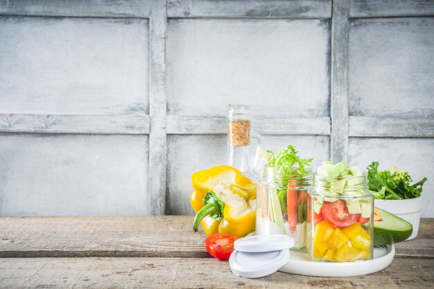 Healthy vegetable salad in jars