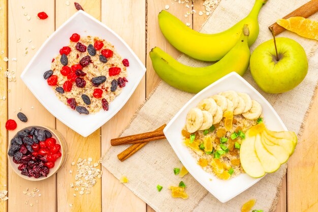 Healthy vegetarian breakfast with oatmeal and fruits