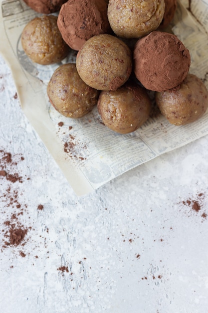 Healthy vegetarian energy balls with chickpea, peanut butter, raisin and cocoa powder