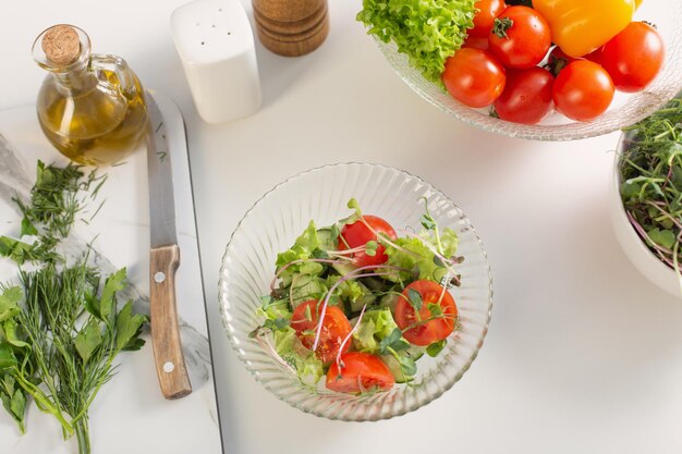 healthy vegetarian salad on white table