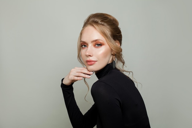 Healthy woman on gray background portrait