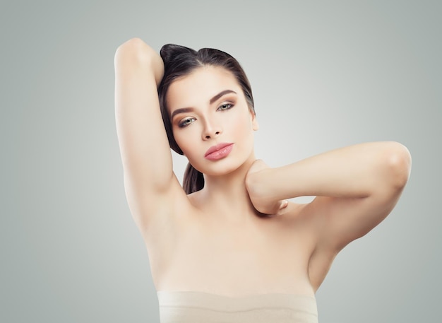 Healthy woman Hands up armpits Body care concept
