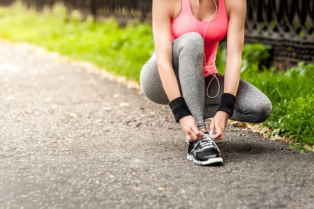 Healthy young woman stretching before Fitness and Exercise