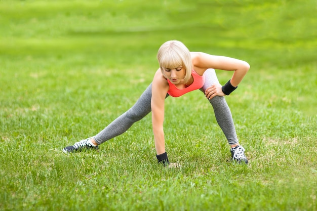 Healthy young woman stretching before Fitness and Exercise