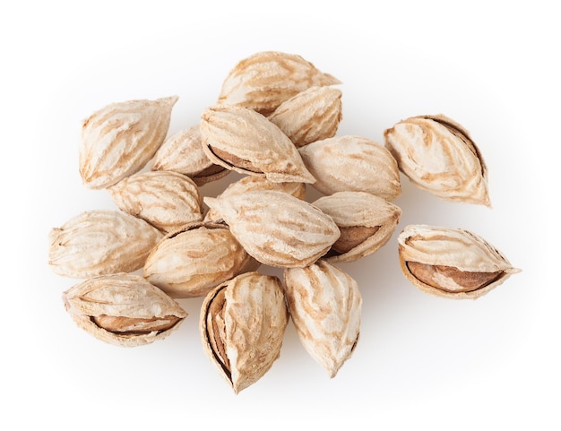 Heap of almonds isolated on white background with clipping path