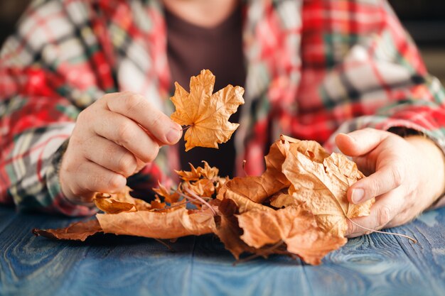 Heap of autumn leaf in hands