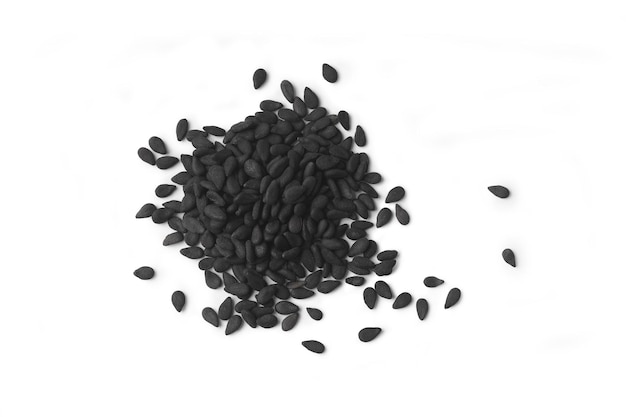 Photo a heap of black sesame seeds on a white backgroundxa