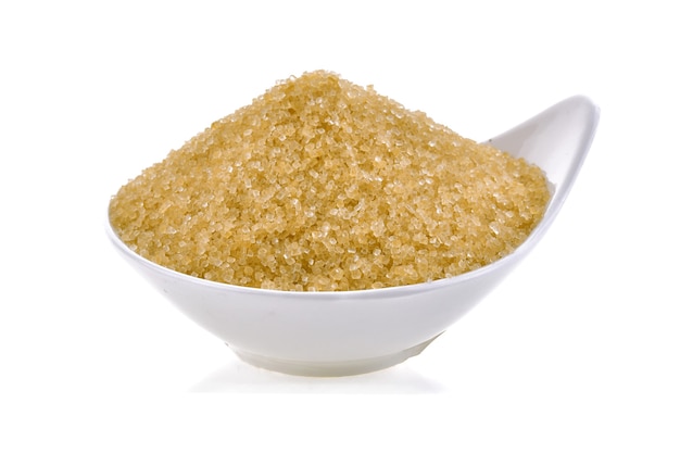 Heap of brown sugar isolated