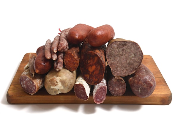 Heap of collection of various sausage on white background