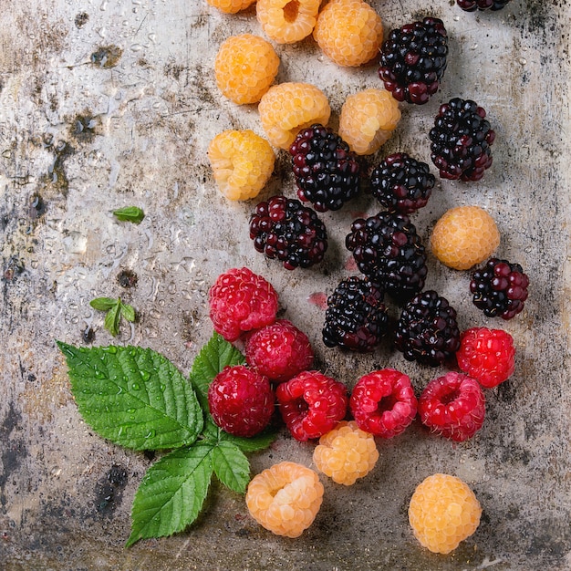 Heap of colorful raspberries