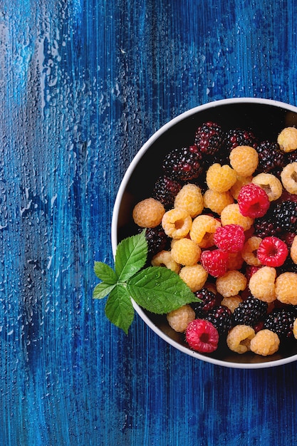 Heap of colorful raspberries