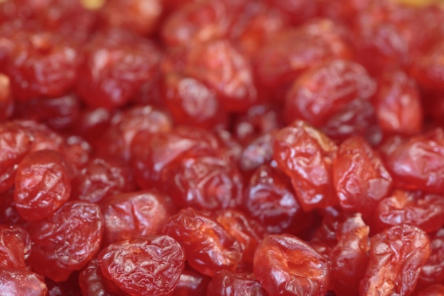 Heap of dried cranberries red dried fruits background