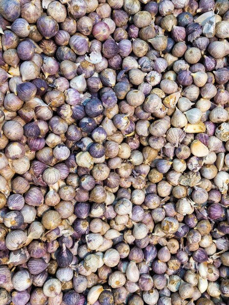 Heap of Elephant garlic for sale in basket background