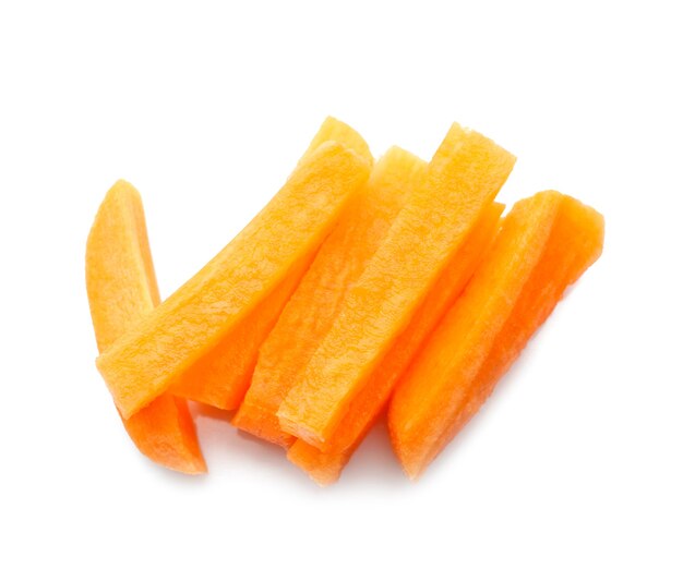 Heap of fresh baby carrot slices on white