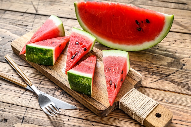 Heap of fresh red sliced watermelon