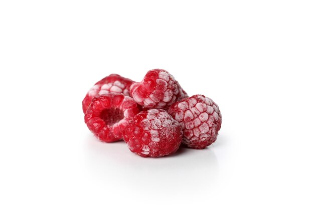 Heap of frozen raspberry isolated on white background.