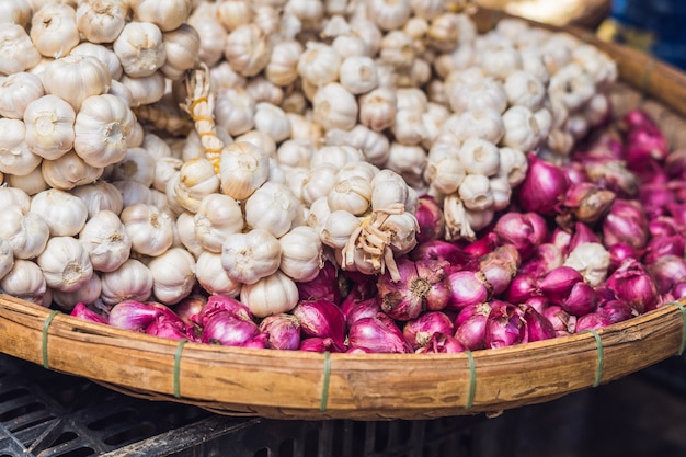 Heap of garlic in a basket