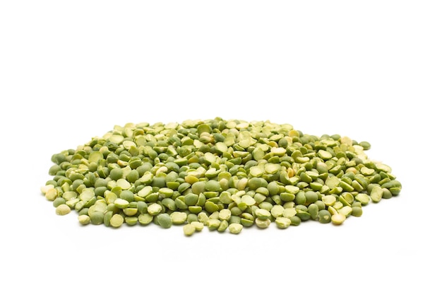 A heap of green lentils on a white background with copy space