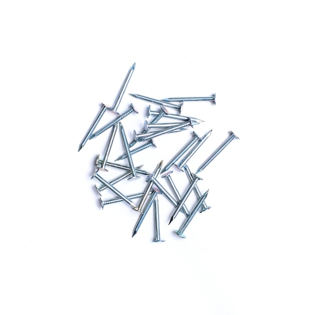 Heap of nails isolated on white background