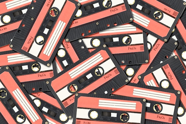 Heap of old audio tape compact cassette background