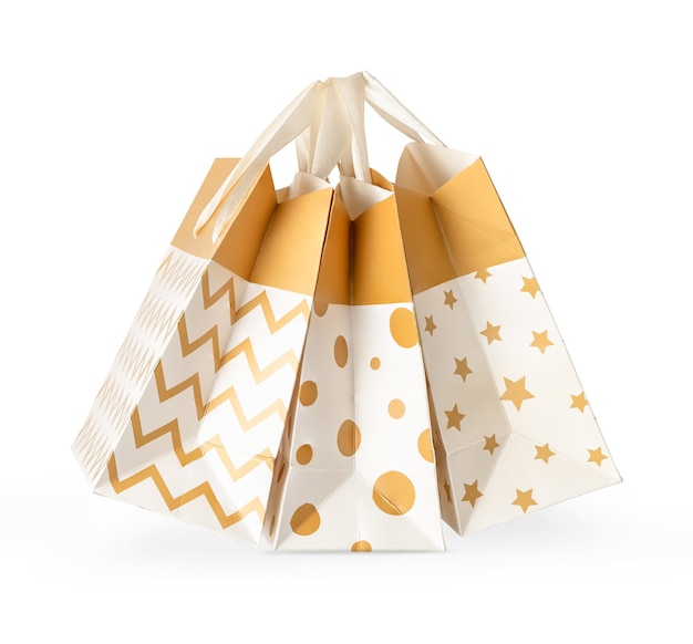 Photo heap of paper gift bags isolated on white background with clipping path.