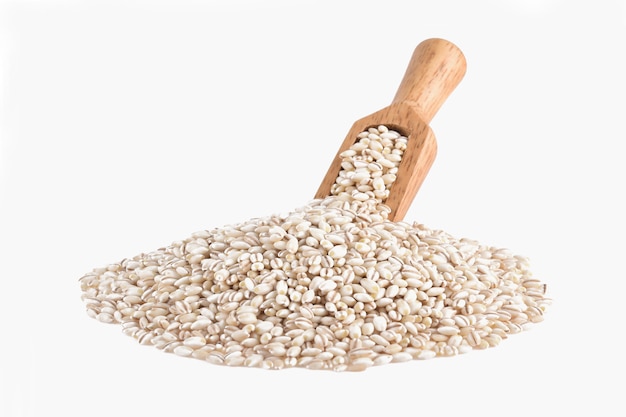 Heap of pearl barley isolated on white