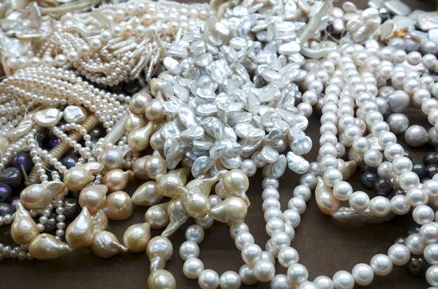 Heap of pearl necklaces