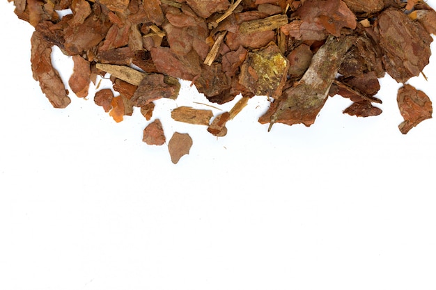 Heap of pine bark isolated