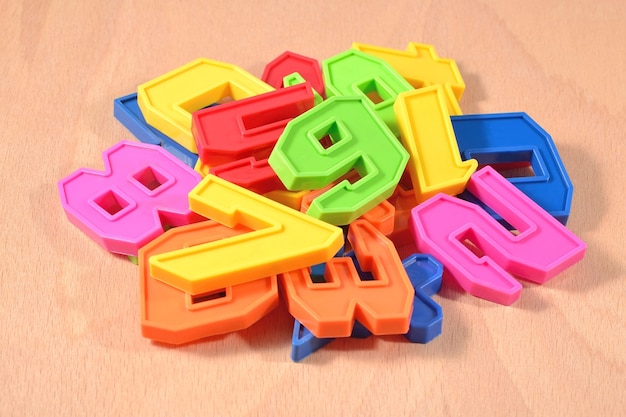 Heap of plastic colored numbers