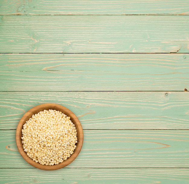 Heap of Puffed Millet on Wooden Table Top View