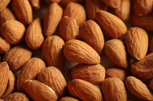 Heap of raw almonds nuts