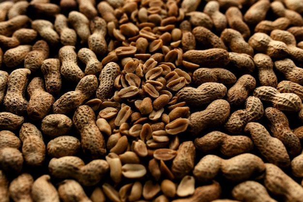 Heap of raw peanuts on the table