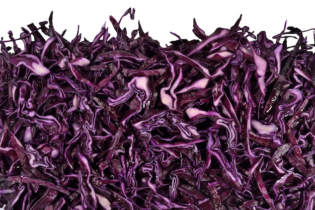 Heap of sliced red cabbage on a white