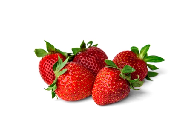 Heap of strawberries isolated on white background.