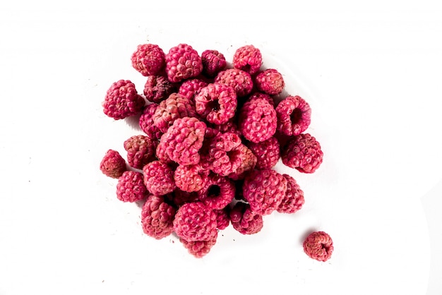 Photo heap of sun dried raspberries