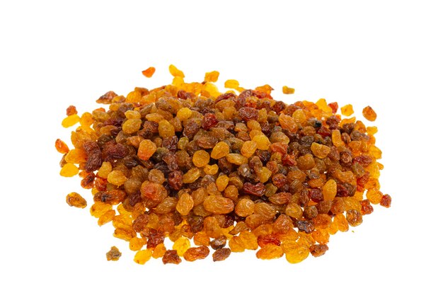 Heap of sweet tasty raisins isolated on white surface